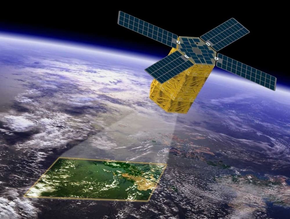 In the picture, the satellite is monitoring the environment: a certain area of the earth.